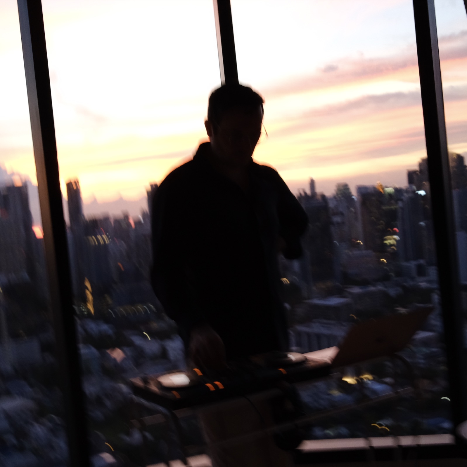 Mirarii against the Bangkok skyline at sunset